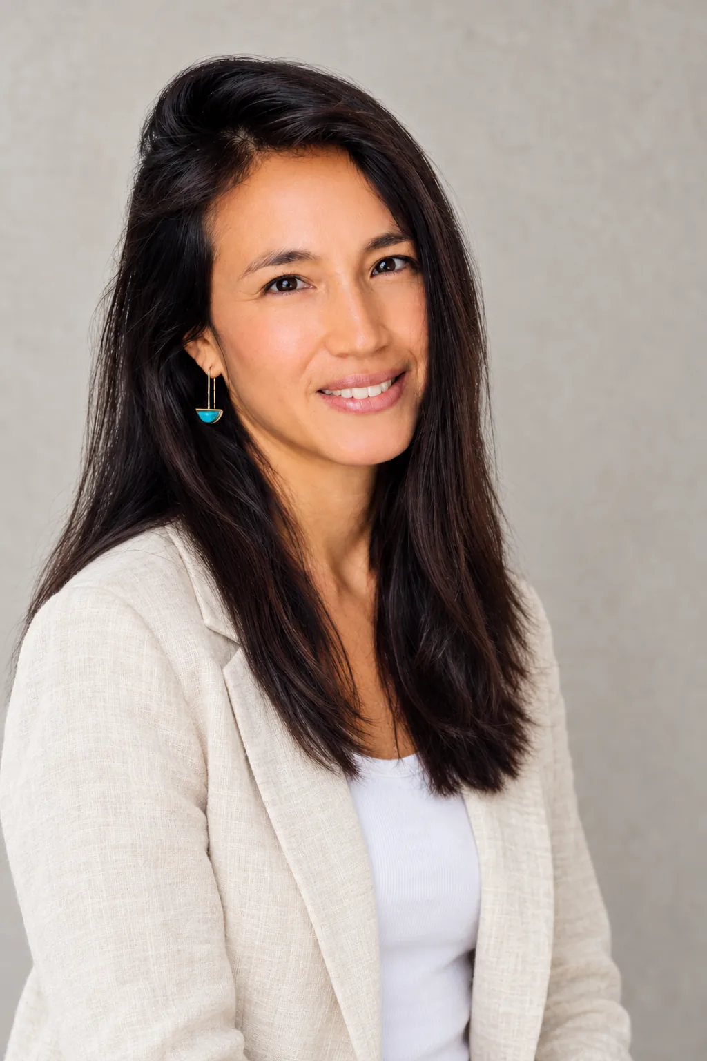Marielisa Padilla in an ivory linen jacket, portrait